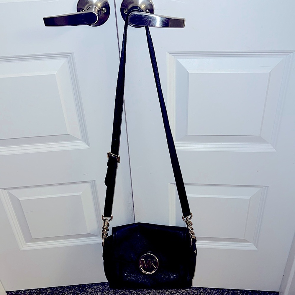 Michael Kors leather crossbody bag.